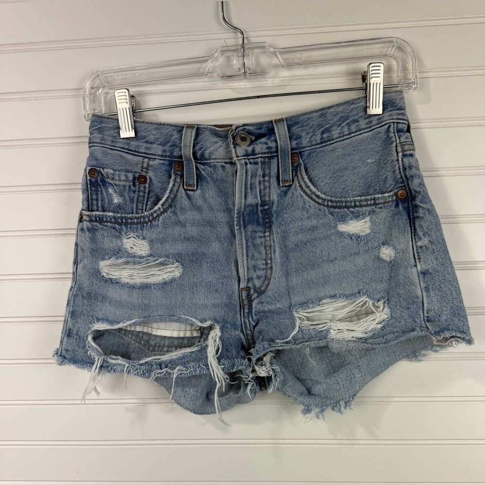 Levi’s womens 501 denim button fly, distressed denim jeans. Size 24